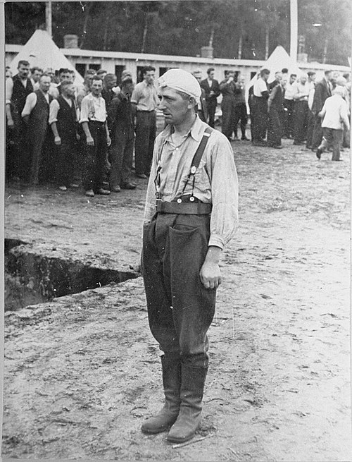 A Polish POW stands at attention in the Appellplatz at Stutthof, October 1939.
