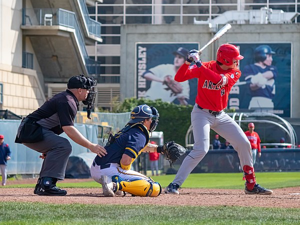 Daniel Susac (right) batting for the Arizona Wildcats in a game against the California Golden Bears in March 2022