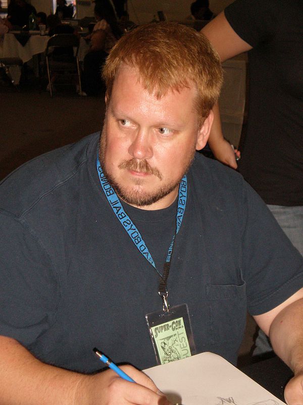 Hughes doing a convention sketch in May 2009