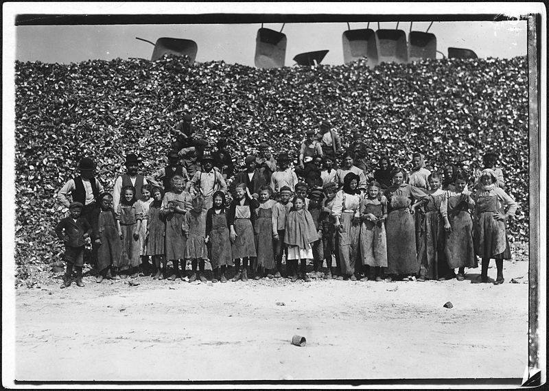 File:All these shuck oysters in the Dunbar Cannery. They begin work about 3 A.M. and work until about 5 P.M. with half an... - NARA - 523415.jpg