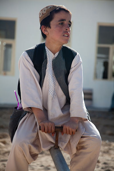 File:An Afghan boy plays on a teeter-totter in Ananzai village, Kandahar province, Afghanistan, Dec. 26, 2011 111226-A-VB845-250.jpg