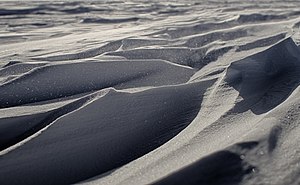 Wind sculpted snow near South Pole Station, forming sastrugi features. Anta0183 (19778502135).jpg