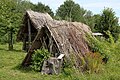 Pit-houses #1 (front) and #2 (back) – Grubenhaus 1 (vorne) und 2 (hinten)