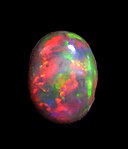Cabochonslipad svart opal