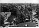 Johannes-R.-Becher-Strasse with the market and the church, June 11, 1987