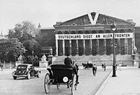 A German V-sign and slogan on the Palais Bourbon in occupied Paris. The banner beneath the "V" reads "Germany is Victorious on All Fronts".