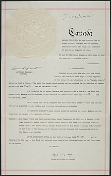 The proclamation of George VI, king of Canada, "declaring that a state of war with the German Reich exists and has existed in our dominion of Canada as and from the tenth day of September, 1939". The Great Seal of Canada is affixed above the Attorney General's signature and the signature of the Governor-General, the Lord Tweedsmuir, is at the top as a witness. Canadian declaration of war on Germany.jpg