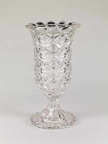 A press glass celery vase, produced between 1850-70, in the collection of the Metropolitan Museum of Art. Celery vase MET DP208117.jpg