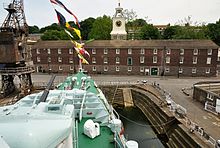 18th-century storehouse, 19th-century dry dock and 20th-century warship preserved at Chatham Chatham Clock Tower Building from HMS Cavalier.jpg