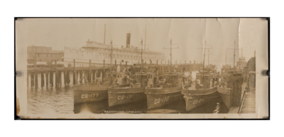 Coast Guard patrol boats CG-177, CG-151, CG-170, CG-278 at Boston Harbor in front of Eastern Steamship Lines SS Governor Dingley.png
