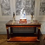 Empire console table; 1804–1814; mahogany, gilded bronze, chiseled gilded bronze and fossil gray marble; 91.5 x 154 x 73.5 cm; Musée des Arts Décoratifs (Paris)[64]