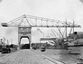 Crane lifting lumber at dock, Bloedel-Donovan Lumber Mills, ca 1922-1923 (INDOCC 1251).jpg