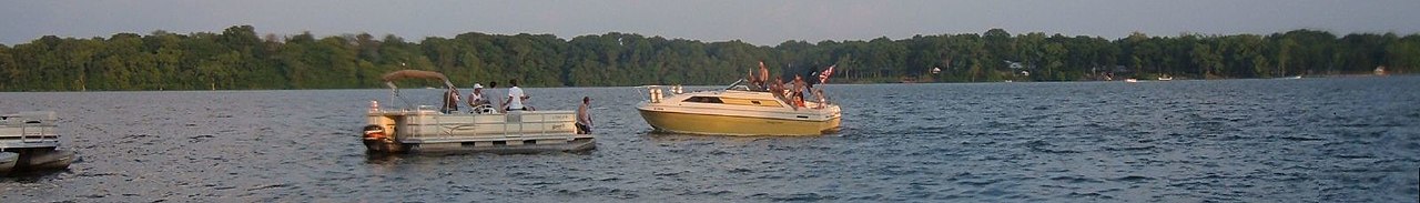 Boaters in the lake in Nelson Park