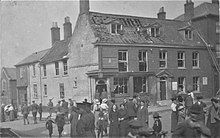 Locals view the damage after the 1915 Zeppelin raid on Dereham, Norfolk