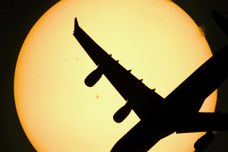 File:Eclipse of the sun by a PLANE (13980493731).jpg