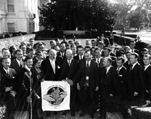 President Dwight D. Eisenhower with the People to People committee in 1960. Eisenhower with People to People committee.jpg