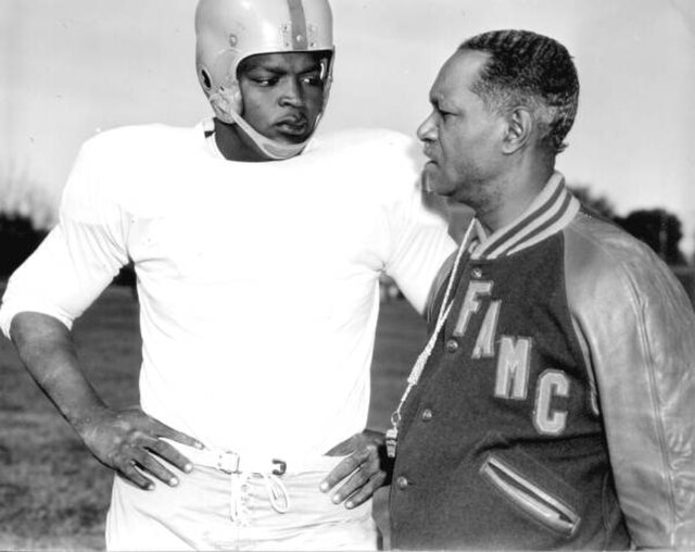 FAMU (formerly FAMC) football coach Jake Gaither talking to one of his players