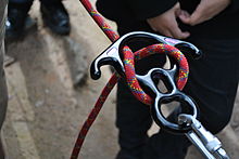 Rescue-style (eared) figure eight descender and rope Figure eight descender with rope.jpg