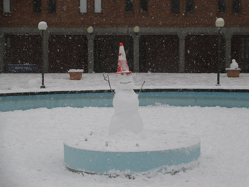 File:Fisher Fountain drained for winter, but adorned with snow person (12786125933).jpg