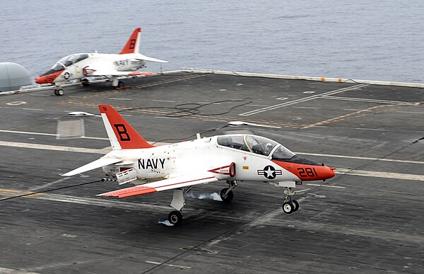 A T-45 Goshawk making an arrested landing on USS Dwight D. Eisenhower in 2011