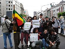 Protesters displaying the three-finger salute at the first Ganja March in Belgrade 2005. Ganjamarsh.jpg