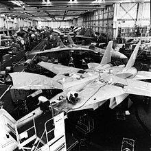 Line of production of the F-14A Tomcat in 1986 Grumman F-14A production line Calverton 1986 mfr 863853 (GHC via RJF) (18355107845).jpg