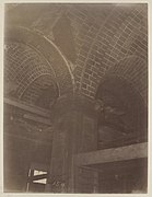 Closeup of completed tile arches and column in entrance hall