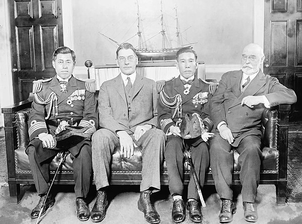 Yamamoto as a naval attaché to the United States, with the Secretary of the Navy Curtis D. Wilbur, Captain Kiyoshi Hasegawa, and Admiral Edward Walter