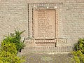 Lápida en homenaje a los obreros de la fábrica D. Jordaan & Zonen, víctimas civiles de la Segunda Guerra Mundial