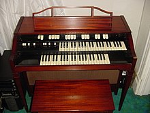 The L-100 spinet was particularly popular in the UK. Hammond L-112.jpg