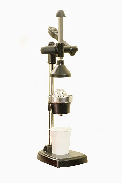 A hand press juicer machine