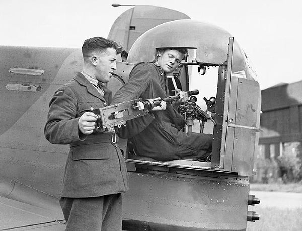 A Browning machine gun being installed in a Whitley's turret, 1940