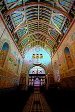 The church interior with decoration by Clayton & Bell Interior of St Michael's Church.jpg