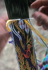 Detail of hair-sash being brocaded on a Jakaltek Maya backstrap loom. JacaltecBrocade.jpg