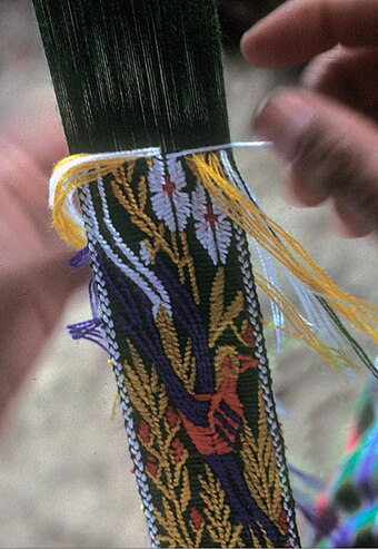 Detail of hair-sash being brocaded on a Jakaltek Maya backstrap loom.
