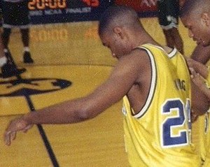 King in 1993 as a University of Michigan basketball player next to Jalen Rose.