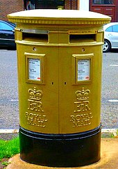 Olympic gold postbox in Cheam Village for local medal winner, Joanna Rowsell