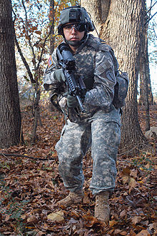 Elements of the Land Warrior system, as showcased by a U.S. Army soldier in 2006. LW high5.jpg