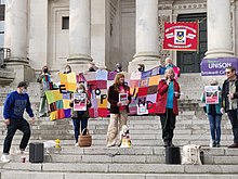 Protesters on the steps of Portsmouth Guildhall in May 2021 Lets Stop Aquind (51151055444).jpg