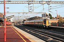 London Midland Class 350 unit stops at Rugby with a service to Birmingham New Street