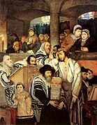 Żydzi modlący się w synagodze podczas Yom Kippur