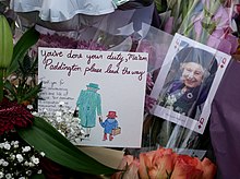 Tributes left in The Mall, London Memorial Offerings to Queen Elizabeth II at the George VI and Queen Elizabeth Memorial (11).jpg