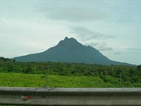 Mount Santubong - 810 m (2,657 ft) Mount Santubong from Santubong Bridge.jpg