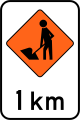 (TW-1B.1.1) Road workers ahead in 1 kilometre