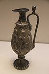 A ewer with Greco-Roman scenes from the tomb of Northern Zhou general Li Xian. It was probably made in Bactria.