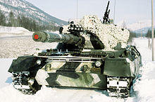 Norwegischer Leopard bei einem Manöver. Auf der Kanone ist das KADAG montiert und teilweise geladen.