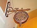 Old clock in Caffe' Le Poste