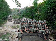 Marines advancing to Central Java on 21 December 1948. Operation Seagull during the second police action. Marines of X Company, 5 Infanterie Bataljon (5th Infantry Battalion) in Babat, Lamongan, East Java, 21 December 1948.jpg