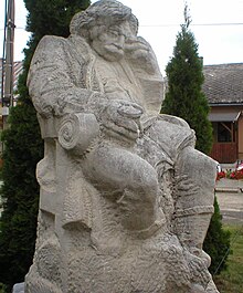 Statue of Paul Pato the personification of procrastination, made by Janos Nagy in Szogyen (now: Svodin) PPszobor.jpg