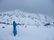 Perisher, New South Wales, is Australia's largest ski resort. Perisherbluecowskiing.JPG